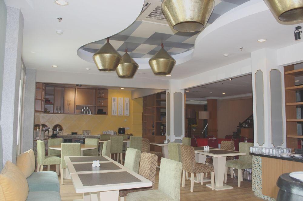 Capital O 1128 Hotel Imara 巨港 外观 照片