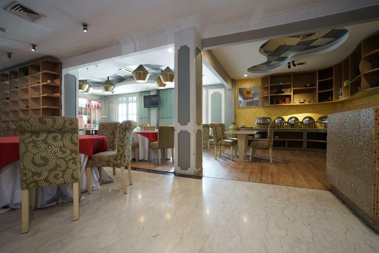 Capital O 1128 Hotel Imara 巨港 外观 照片