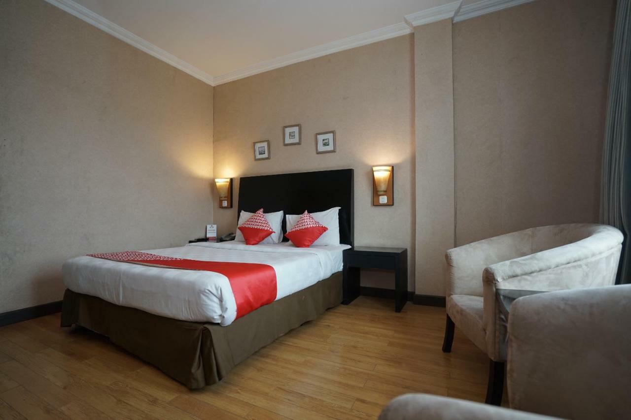 Capital O 1128 Hotel Imara 巨港 外观 照片