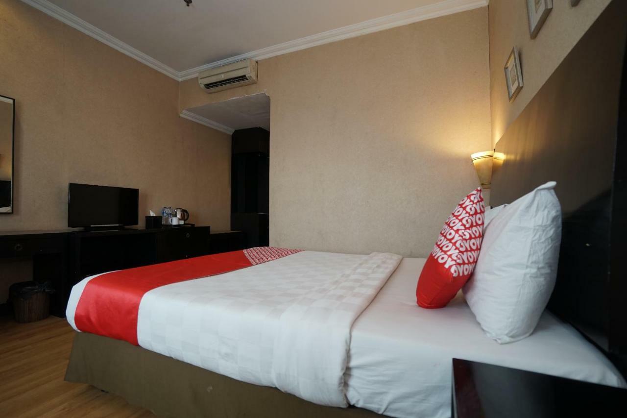 Capital O 1128 Hotel Imara 巨港 外观 照片