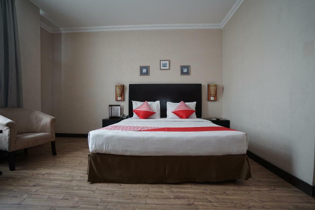 Capital O 1128 Hotel Imara 巨港 外观 照片