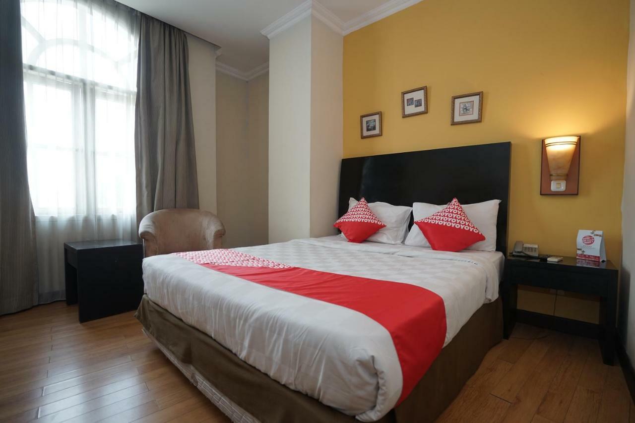 Capital O 1128 Hotel Imara 巨港 外观 照片