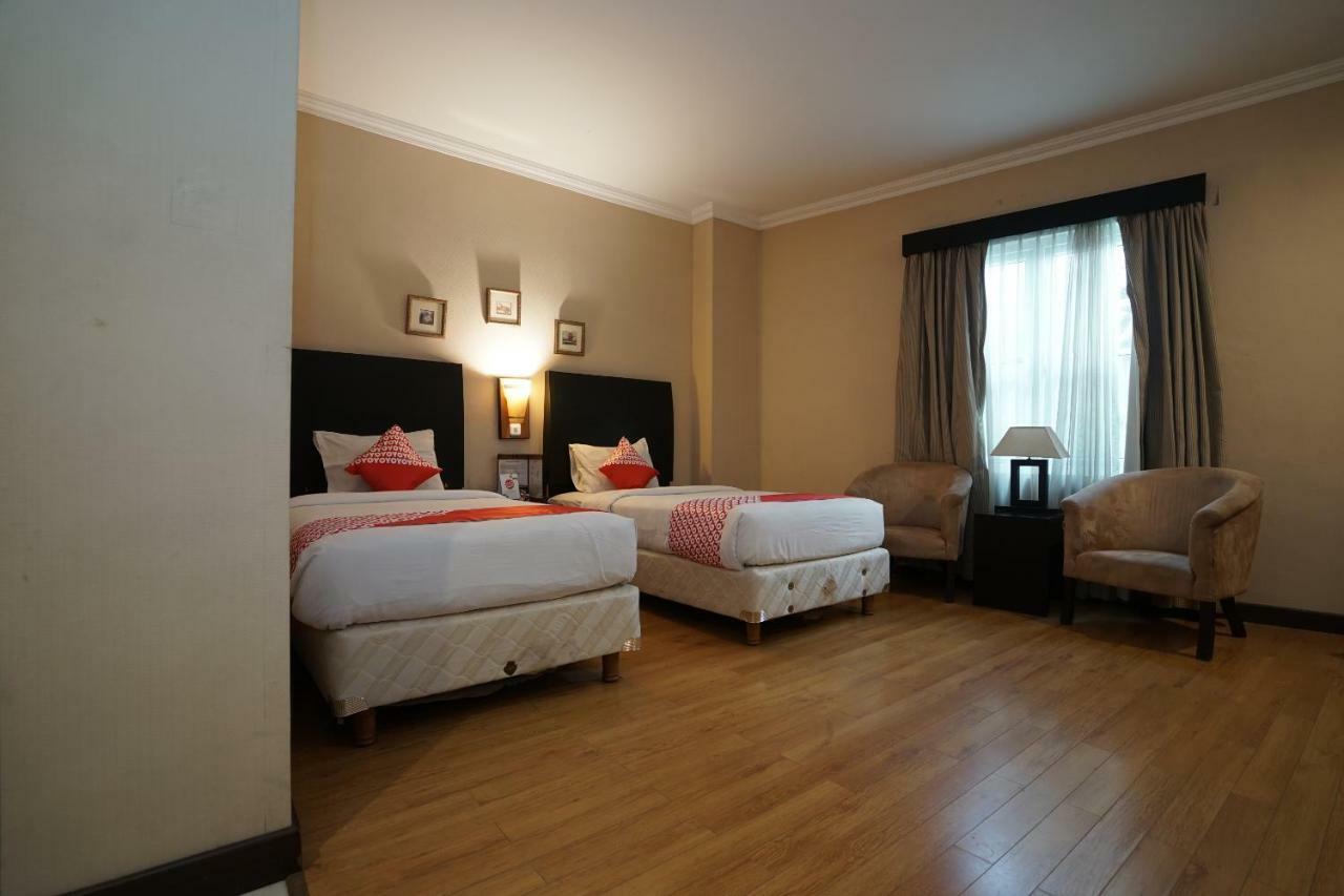 Capital O 1128 Hotel Imara 巨港 外观 照片
