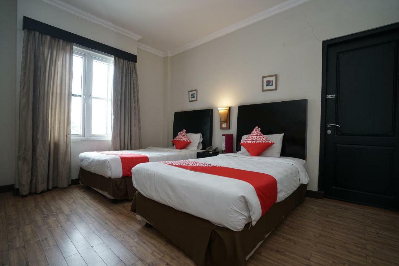 Capital O 1128 Hotel Imara 巨港 外观 照片