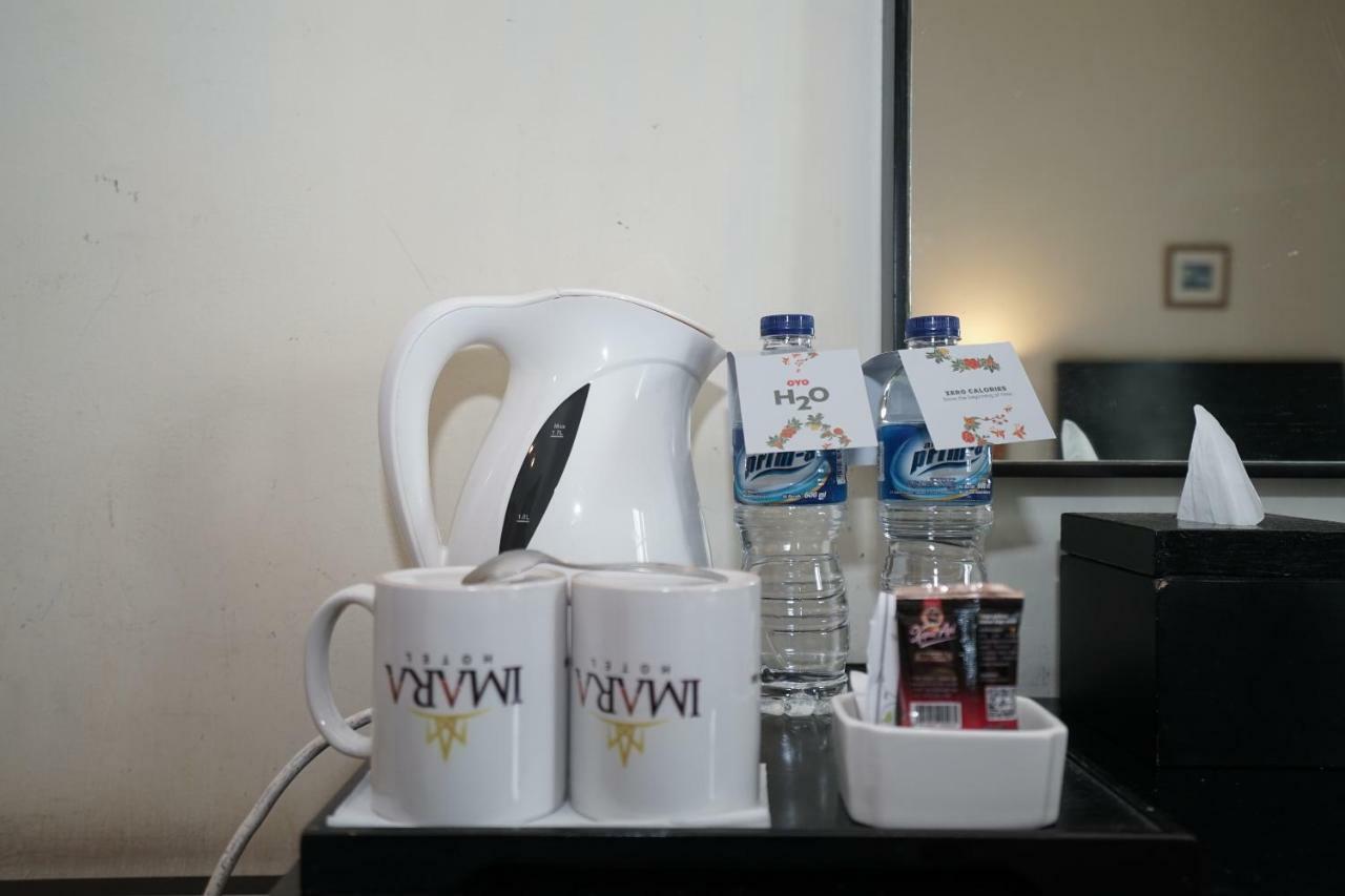 Capital O 1128 Hotel Imara 巨港 外观 照片