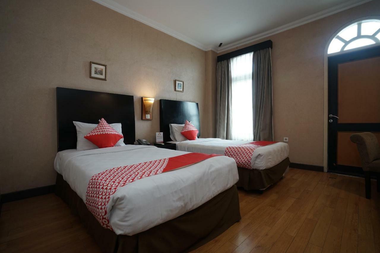 Capital O 1128 Hotel Imara 巨港 外观 照片