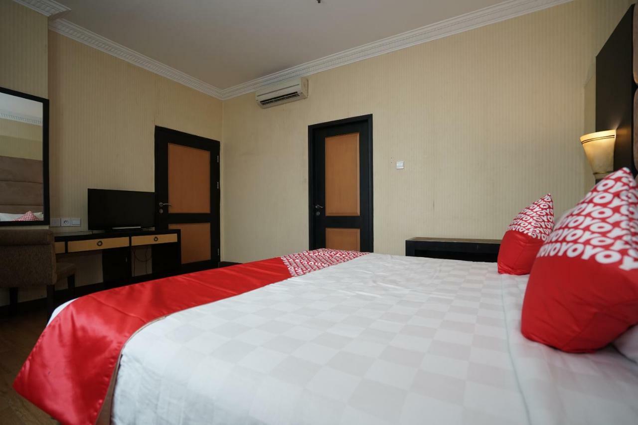 Capital O 1128 Hotel Imara 巨港 外观 照片