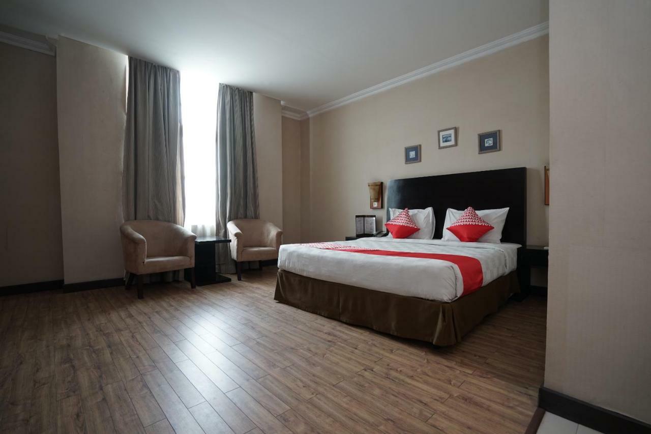 Capital O 1128 Hotel Imara 巨港 外观 照片