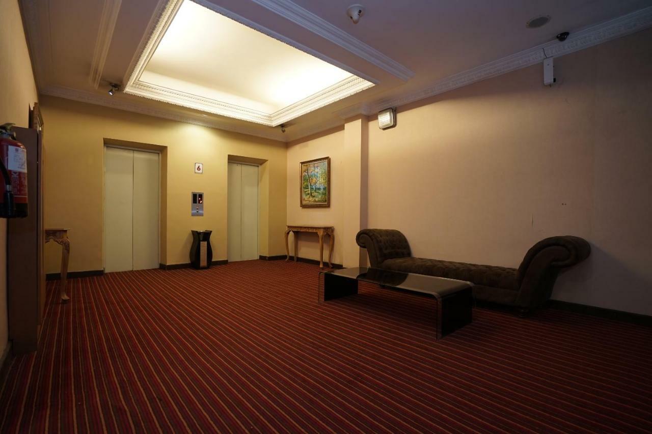 Capital O 1128 Hotel Imara 巨港 外观 照片