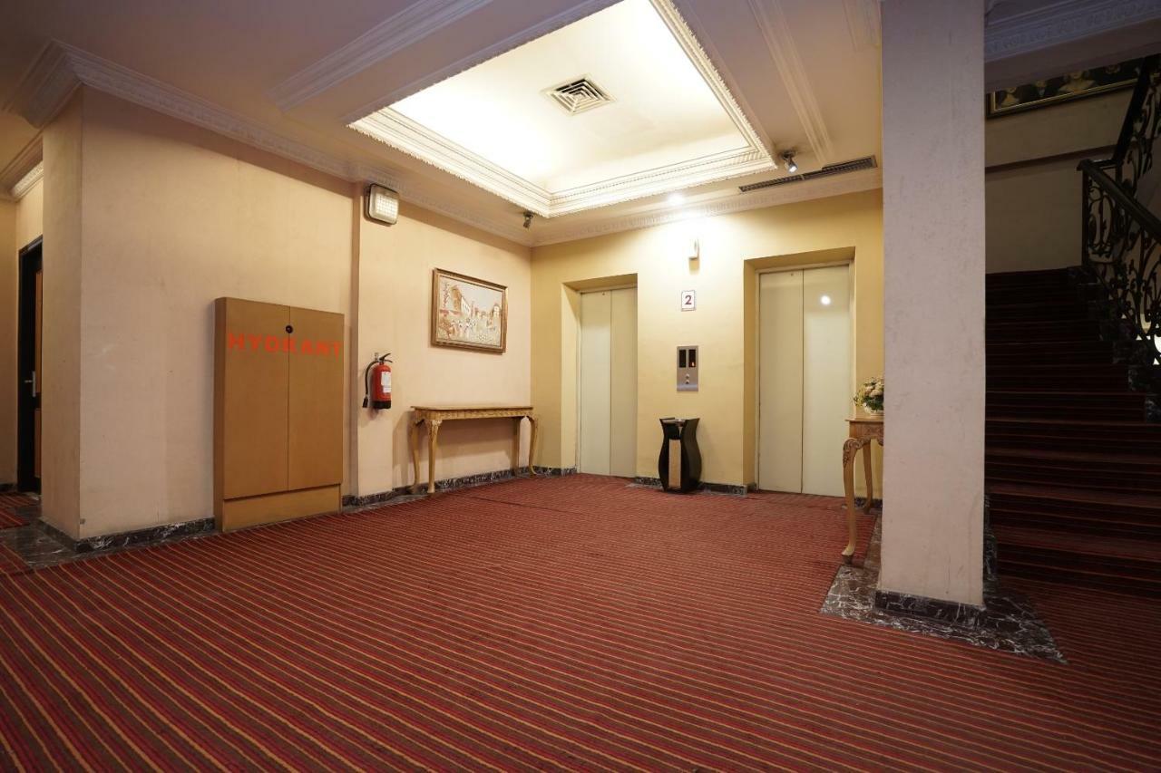 Capital O 1128 Hotel Imara 巨港 外观 照片