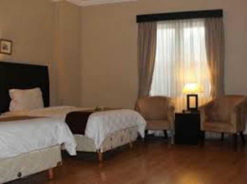 Capital O 1128 Hotel Imara 巨港 外观 照片